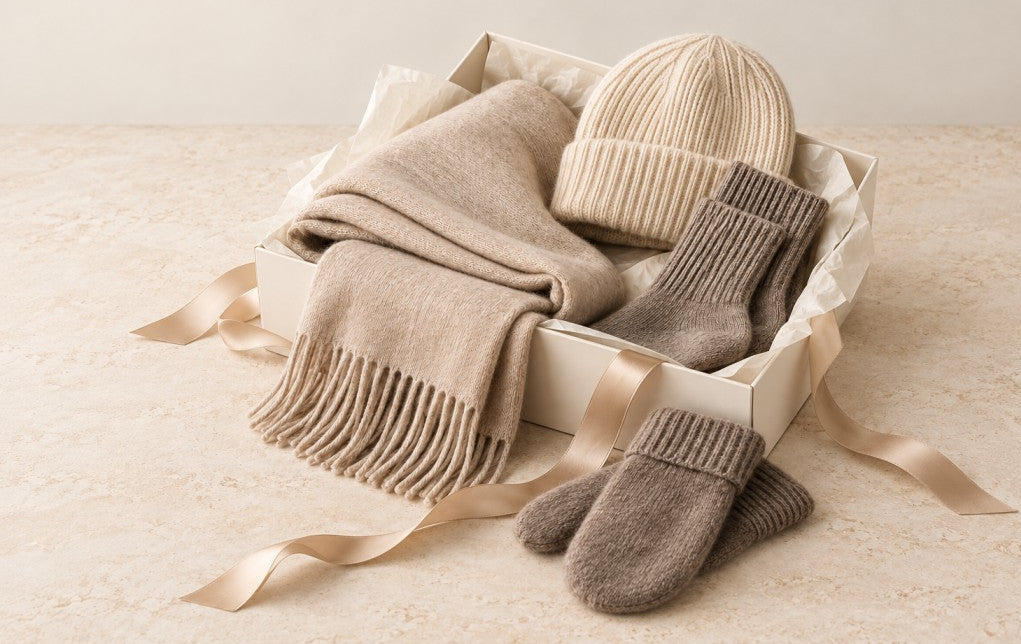 Cashmere Casa winter gifts tied with a burgundy ribbon